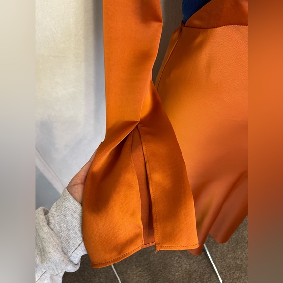 Beautiful rust color, long sleeve cut, out dress. - Picture 3 of 7